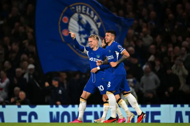 Mykhaylo Mudryk of Chelsea celebrates with teammate Enzo Fernandez