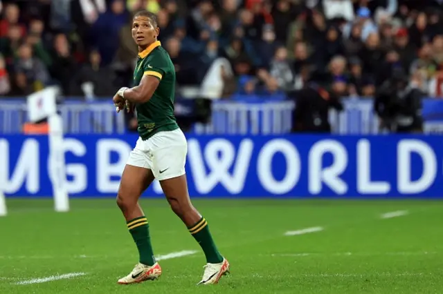 South Africa's fly-half Manie Libbok leaves the field as he is substituted