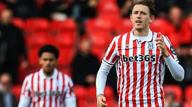 Luke McNally celebrates scoring for Stoke