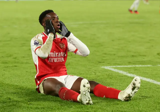 Nketiah holds his head in disbelief after missing a good chance.