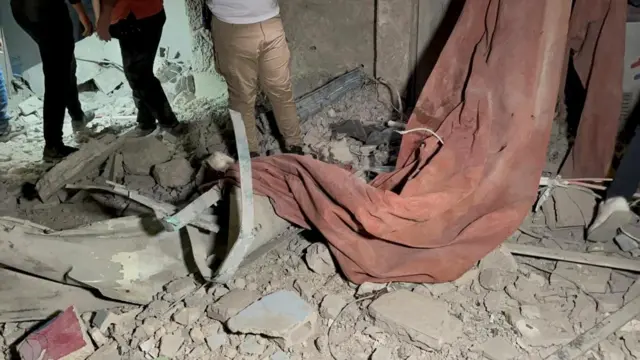 Debris from a building following an Israeli air strike