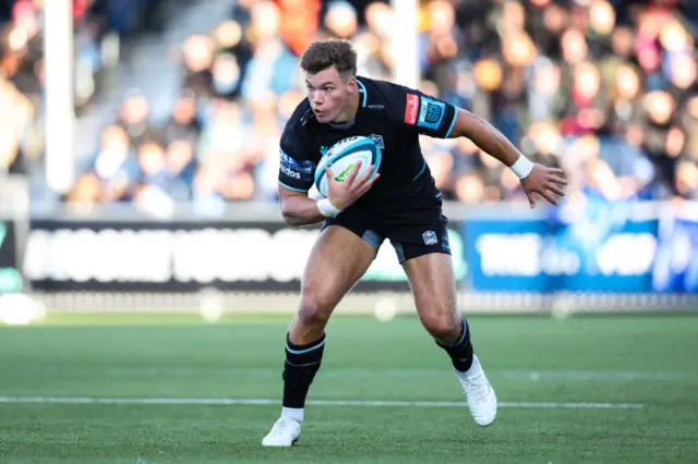 Huw Jones in action