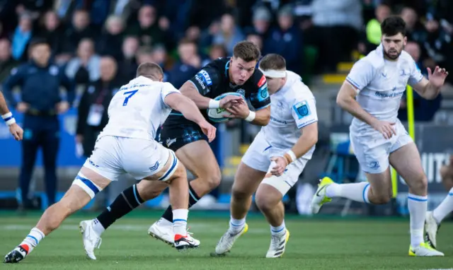 Huw Jones carries