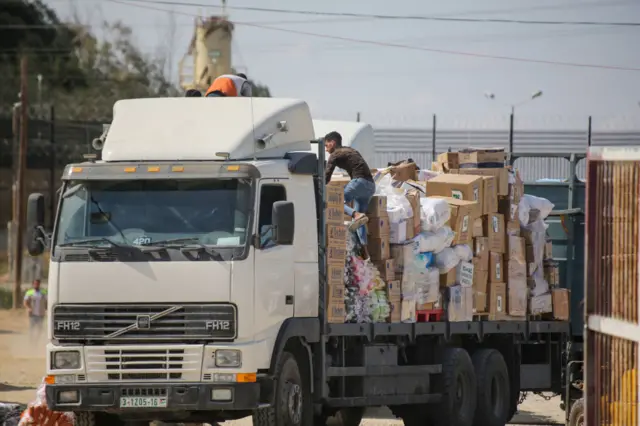 A truck is unloaded in Gaza