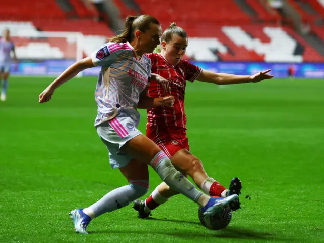 Katie McCabe in action with Bristol City's Carrie Jones