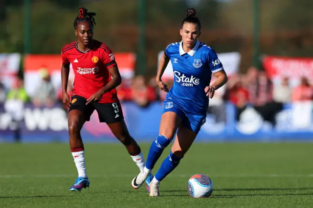 Katrine Veje of Everton battles for possession with Melvine Malard