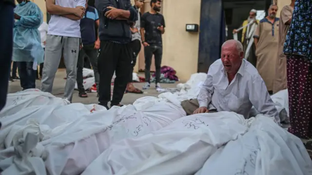 A man mourns at Al Aqsa hospital in Gaza