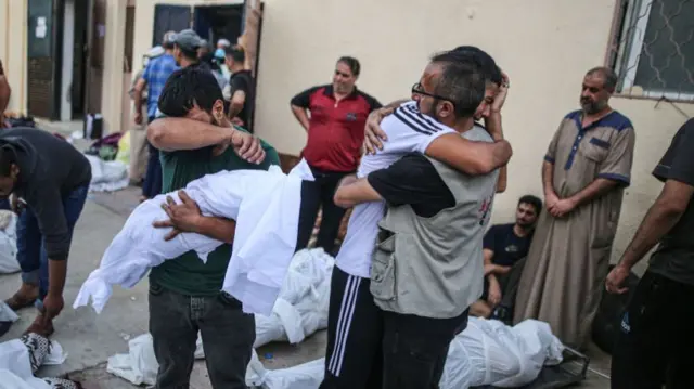 Mourners at Al Aqsa hospital in central Gaza