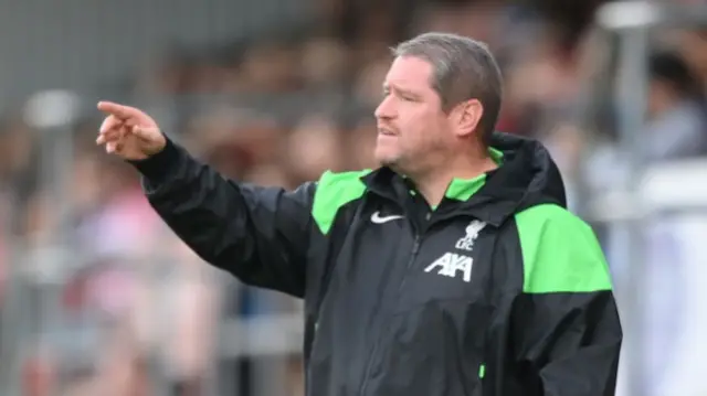 Matt Beard, Manager of Liverpool, gives the team instructions