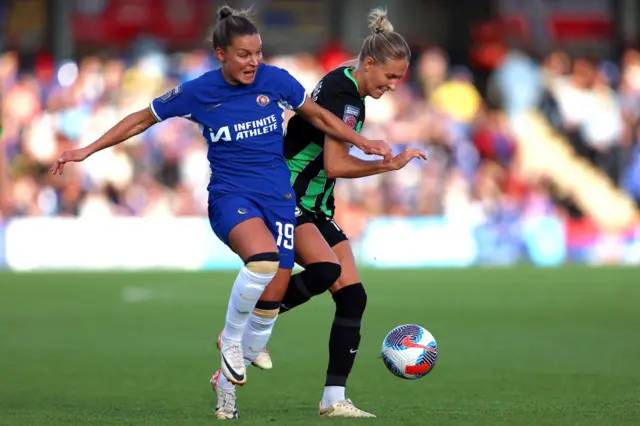 Johanna Rytting Kaneryd of Chelsea battles for possession with Emma Kullberg