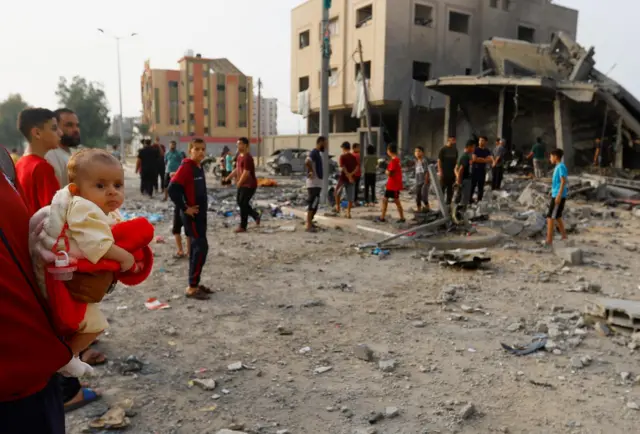 The aftermath of a strike in Khan Younis, in the southern Gaza Strip, on Monday morning