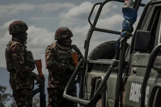 East African Regional Force (EACRF) soldiers guard Rumangabo camp after the meeting between EACRF officials and M23 rebels during the handover ceremony at Rumangabo camp in eastern Democratic Republic of Congo on January 6, 2023.