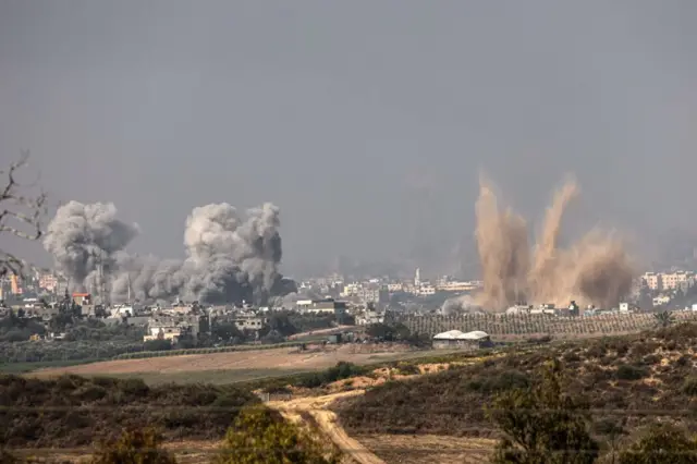 A view from the southern Israeli city of Sderot shows smoke ascending over northern Gaza