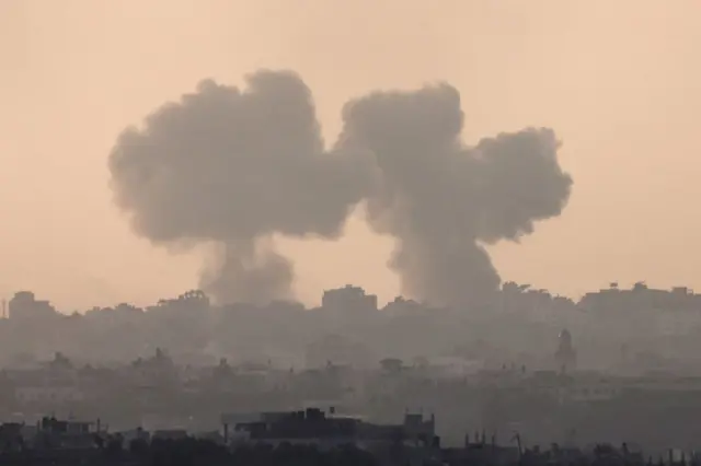 A photo taken from the southern Israeli city of Sderot shows columns of smoke billowing from two strikes in Gaza