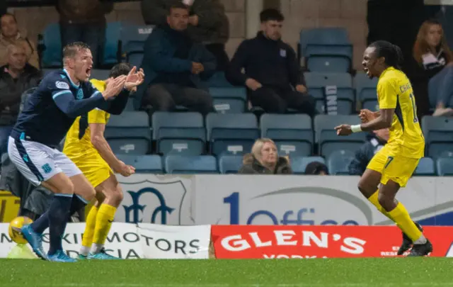 Regan Charles-Cook celebrates