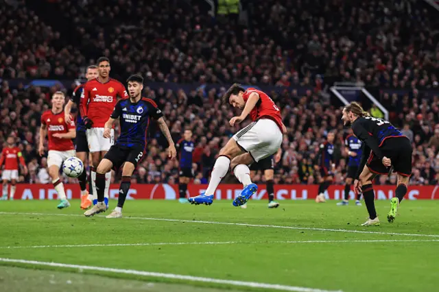 Harry Maguire of Manchester United scores the opening goal