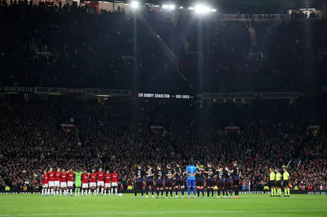 Manchester United and FC Copenhagen players hold a minutes silence