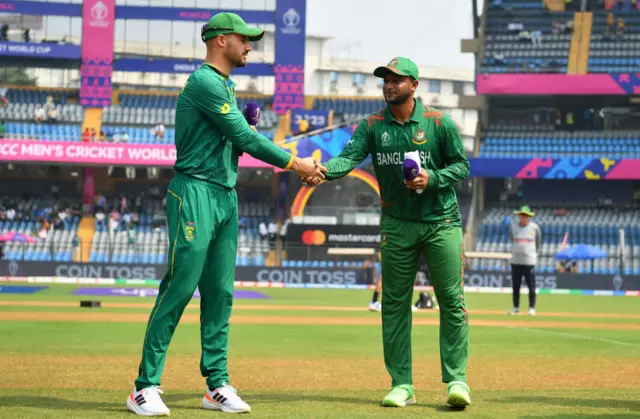 Shakib Al Hasan shaking hands with  Aiden Markram