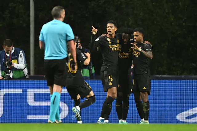 Rodrygo celebrates with teammate after scoring