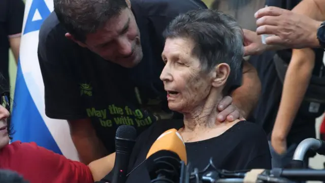 Yocheved Lifschitz, 85, speaks with the media after being released by Hamas