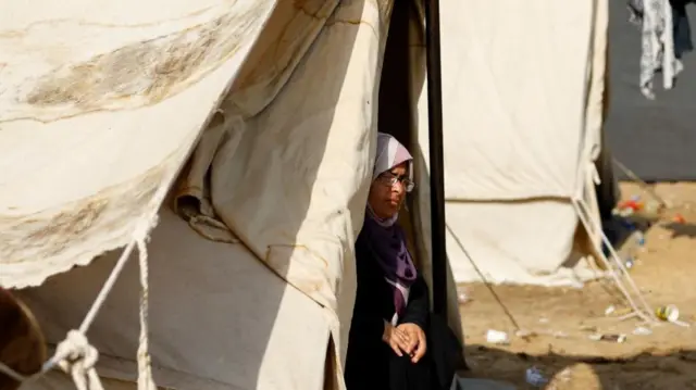 A displaced woman living in a tent in Khan Younis in the southern Gaza Strip, photographed on Tuesday