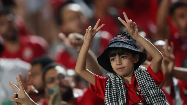 A young fan at Tuesday's African Football League game between Egypt's Al Ahly and Tanzania's Simba SC.