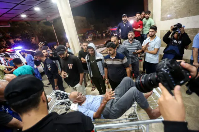 Palestinians injured in Israeli air raids arrive at Nasser Medical Hospital