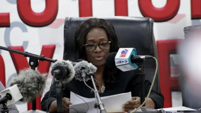 The chairperson of the National Election Commission Davidetta Browne Lassanah, announces progressive preliminary results at the Commission's headquater, Sinkor, outside Monrovia, Liberia, 17 October 2023.