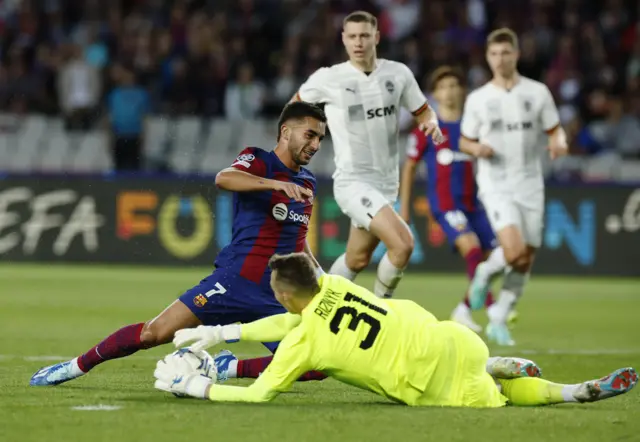 FC Barcelona's Ferran Torres in action with Shakhtar Donetsk's Dmytro Riznyk