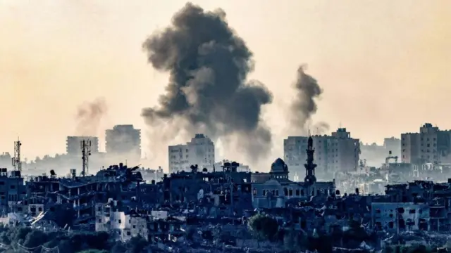 A picture taken from the southern Israeli city of Sderot on October 25, 2023, shows smoke ascending over the northern Gaza Strip following an Israeli strike, amid the ongoing battles between Israel and the Palestinian group Hamas.