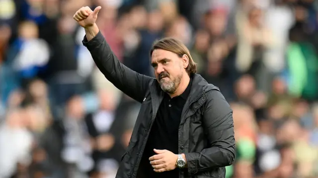 Daniel Farke gives the Leeds fans a thumbs up