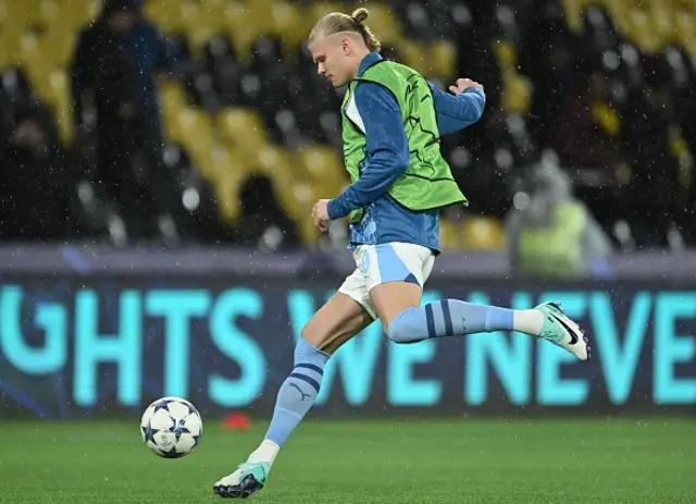 Erling Haaland kicks the ball during a warm-up