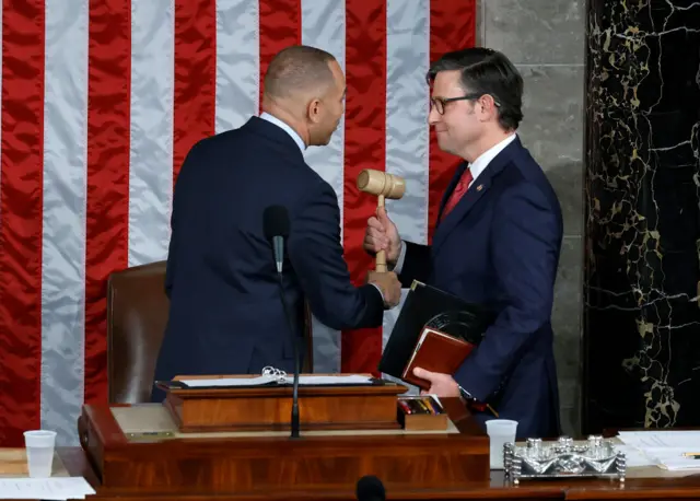 Hakeem Jeffries hands over the gavel to Mike Johnson