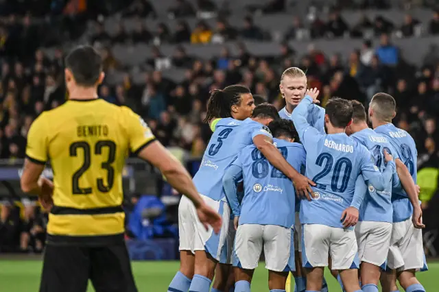 Manchester City celebrate their final goal of the game