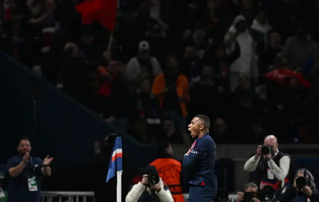 Kylian Mbappe celebrates scoring