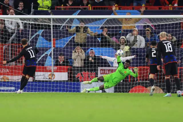 Andre Onana saves a penalty from FC Copenhagen's Jordan Larsson