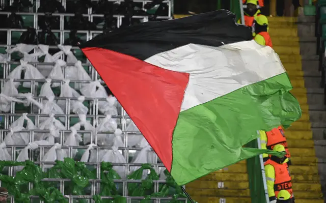 A flag in the Green Brigade section