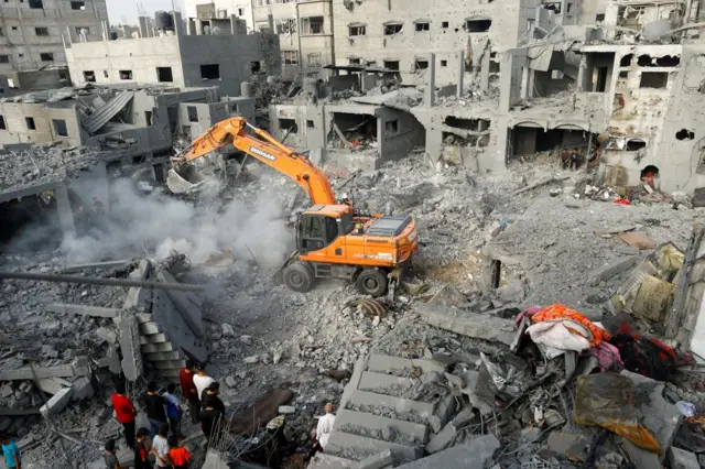 The aftermath of an Israeli strike in Khan Younis in Gaza on Wednesday morning