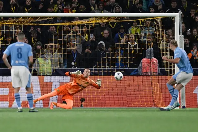 Erling Haaland shoots from the penalty spot