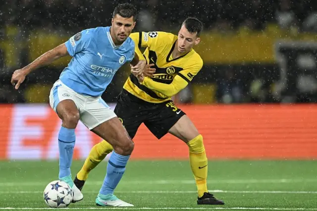 Rodri fights for the ball with Young Boys' Swiss Sandro Lauper