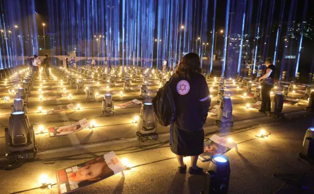 224 light projectors signifying those abducted by Hamas, light the sky near the Arena sports hall in Jerusalem, Israel, 26 October 2023.