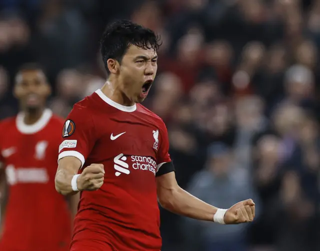 Endo celebrates scoring his first goal for Liverpool