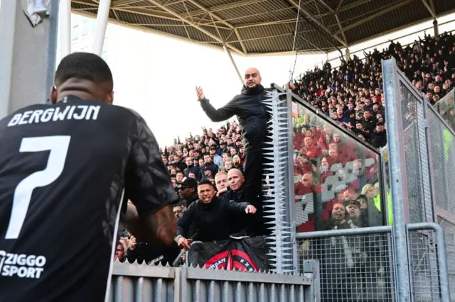 Fan gestures at Steven Bergwijn