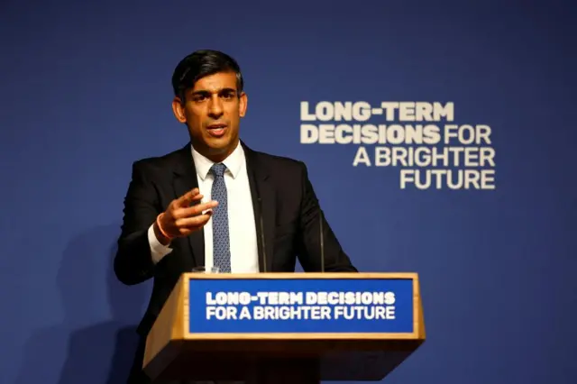 Rishi Sunak giving remarks in London