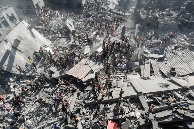 The aftermath of a strike in Khan Younis, in the southern Gaza Strip, on Thursday