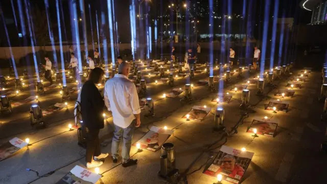 224 light projectors signifying those abducted by Hamas, light the sky near the Arena sports hall in Jerusalem, Israel, 26 October 2023.