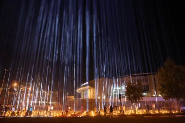 224 light projectors signifying those abducted by Hamas, light the sky near the Arena sports hall in Jerusalem, Israel, 26 October 2023.