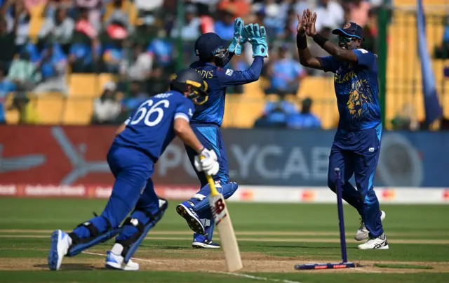 Sri Lanka celebrate after Joe Root is run out