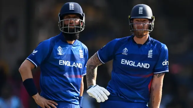 Ben Stokes and Moeen Ali watch the big screen during a review