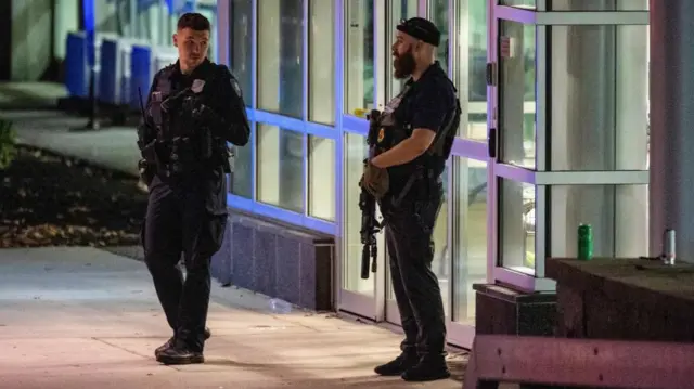 Armed police officers outside a hospital